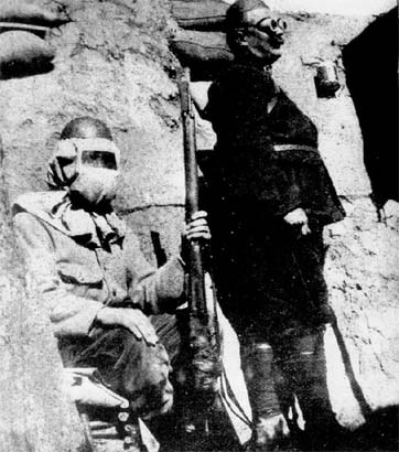 The British soldiers with gas masks 