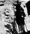 The British soldiers with gas masks. 